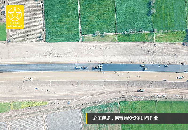 施工現(xiàn)場，瀝青鋪設設備進行作業(yè)